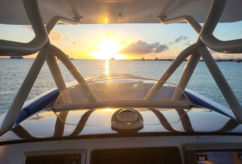 Sunset & Champagne Cruise , Golden light over turquoise seas   MOTION 42 SF CABIN